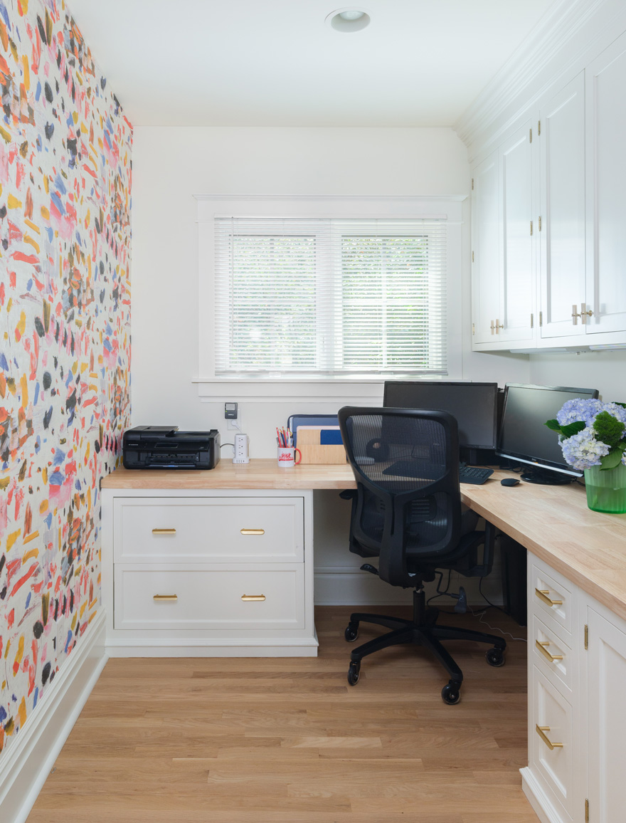 Home office with colorful accent wall and built-in cabinetry in Webster Groves, Missouri — design build firms St. Louis